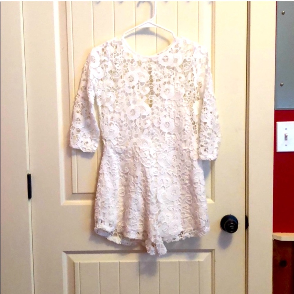 Cutest lace romper 3/4 sleeve great for day event worn once for 3 hours